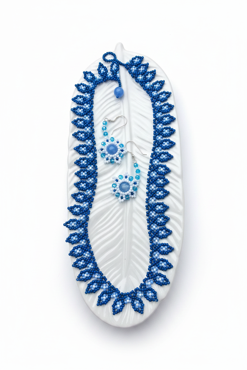 Jewelry on white background, feather tip down