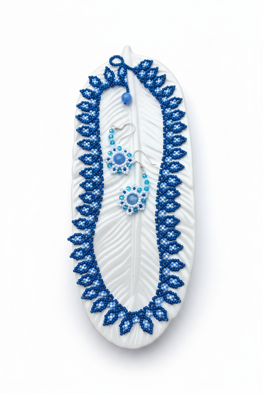 Jewelry on white background, feather tip down